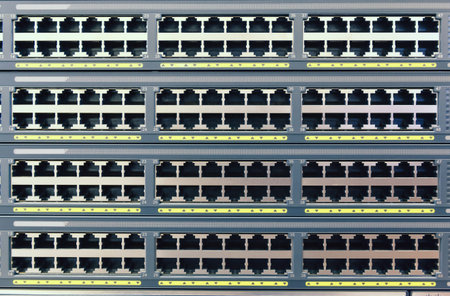 background a plurality of copper ports RJ45 on a stack of switches