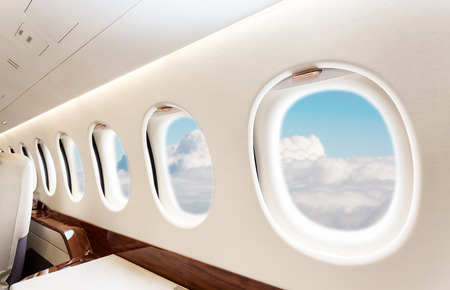 Luxury interior in bright colors of genuine leather in the business jetの写真素材