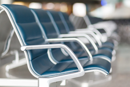 Empty seats in the departure lounge at the airportの写真素材