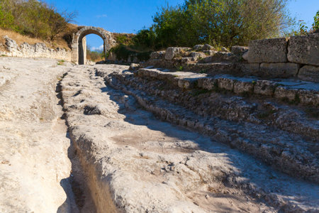 gate in Medieval cave city-fortress Chufut-Kale in the mountains, Bakhchisaray, Crimea.の写真素材