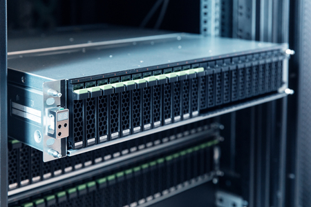 2,5 inch hard disks drive in enclosure in the storage system in the data centerの写真素材