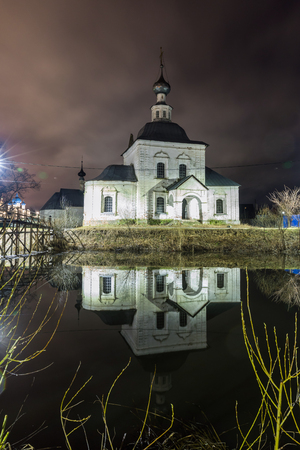 Suzdal, Russia. wooden bridge through the Kamenka Riverの写真素材