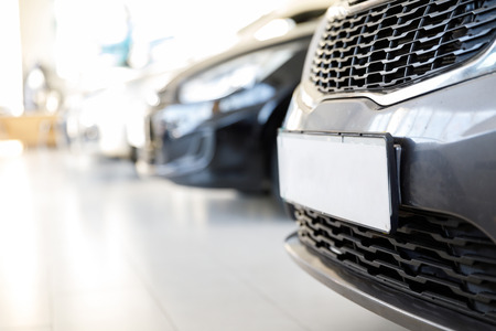 View of row Pre-Owned Cars at car showroomの写真素材