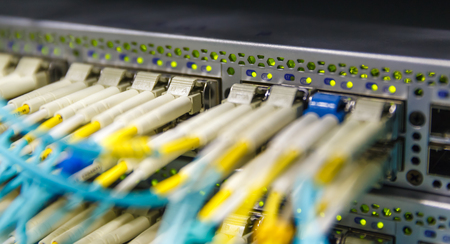 Optical switch and colorfull FC cables connected equipment in data centerの写真素材