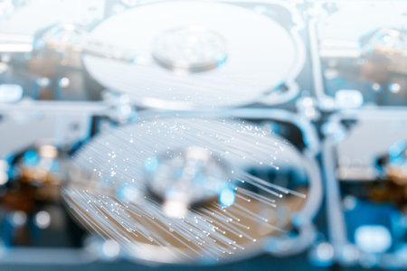 Server hard disks, illuminated optical fiber with blurred lights.