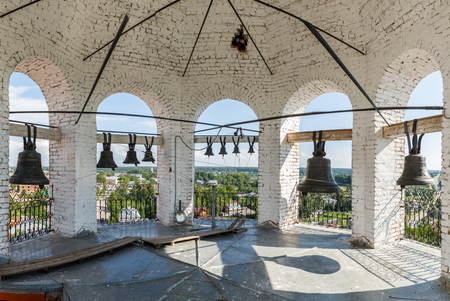 bells in the ancient bell tower of an orthodox church. The Nativity Church, Totma, Russia.の写真素材