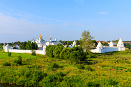 Beautiful panoramic view of Suzdal, Russia. Intercession of the Theotokos convent at the small river. Suzdal is a famous tourist attraction and part of the Golden Ring of Russia.の写真素材