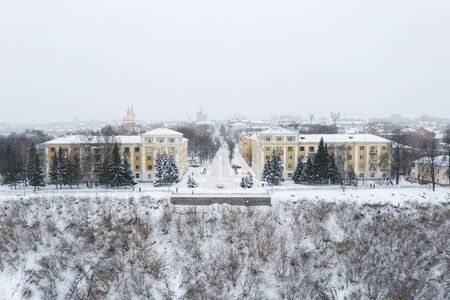 Kirov and the high bank of the river Vyatka and the Alexander Grin Embankment and the rotunda on a cloudy winter day.の写真素材