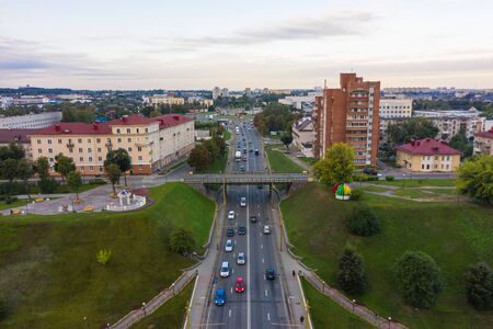 The embankment, the Neman river and the Old bridge in Grodno. Autumn ,evening, the city in the sunshine against a background of dark clouds.の写真素材