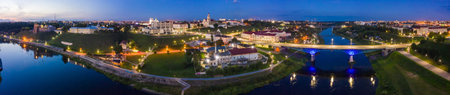The embankment, the Neman river and the Old bridge in Grodno. Autumn ,evening, the city in the...