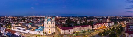 St. Francis Xavier Cathedral And Traffic In Mostowaja And Kirova Streets in the morning light. Grodno city in Belarus. Aerial view from a drone.の写真素材