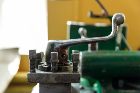 spindle, tool holder and old green lathe machine tool equipment.