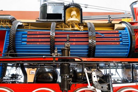 boiler and chimneys in steam train, detail of mechanism a vintage russian steam train locomotive.の写真素材