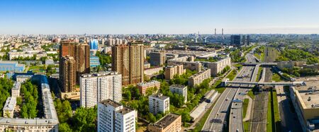 Aerial top view of road junction in Moscow from above, automobile traffic and the old Ugreshskaya railway station in the Moscow industrial zone near the automobile ring highway.の写真素材
