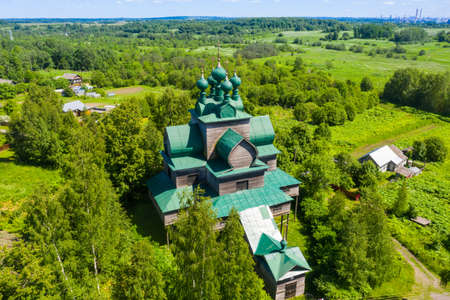 Beautiful Orthodox wooden church of the Assumption of the Blessed Virgin Mary in the city of Cherepovets in the Vologda region.の写真素材