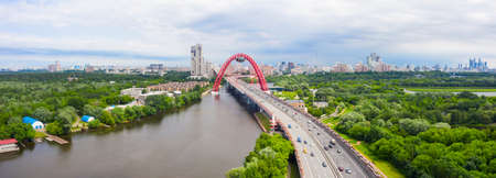 Panoramic view of Moscow on a sunny day, Russia. Picturesque region in the north-west of Moscow city. Zhivopisny bridge across the Moscow river.の写真素材