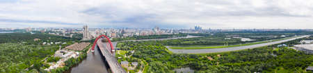 Panoramic view of Moscow on a sunny day, Russia. Picturesque region in the north-west of Moscow city. Zhivopisny bridge across the Moscow river.の写真素材