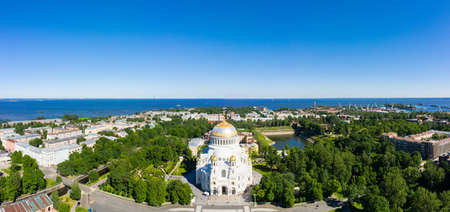 Naval cathedral of Saint Nicholas in Kronstadt, St.-Petersburg, Russia. Panoramic view of the center of Kronstadt with the cathedral on a sunny summer dayの写真素材