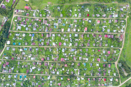Village top view or vegetable gardens in the summer. Country houses view from the droneの写真素材