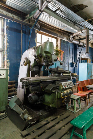 Old Soviet lathe, machine tool equipment. Locksmith shop in the railway depot