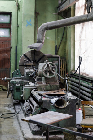 Old Soviet lathe, machine tool equipment. Locksmith shop in the railway depotの写真素材