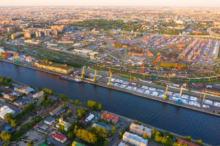 Aerial view of cargo ship, cargo container in warehouse harbor in the Morskie Vorota district in St....