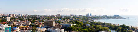 A picturesque panorama of the sea coast with a sandy beach in a resort near the city of Anapa and the village of Vityazevoの写真素材