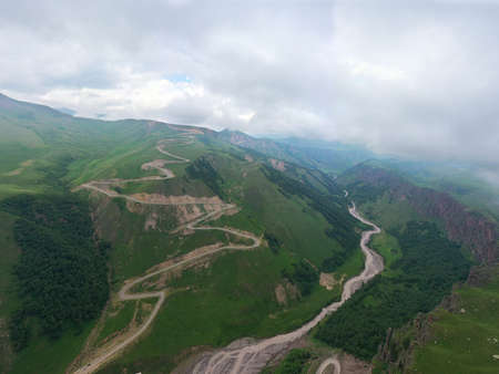 A wonderful mountain road with a serpentine in the North Caucasus from the Narzan Valley to Dzhily-Su, Russiaの写真素材