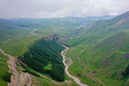 A wonderful mountain road with a serpentine in the North Caucasus from the Narzan Valley to Dzhily-Su, Russiaの写真素材