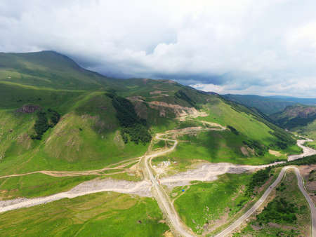 A wonderful mountain road with a serpentine in the North Caucasus from the Narzan Valley to Dzhily-Su, Russiaの写真素材