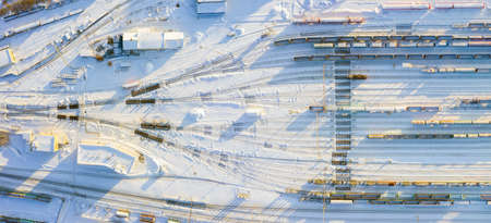 Branches of the railway at the marshalling yard, a lot of freight wagons from the heightの写真素材