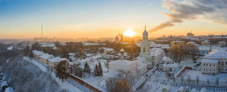 the city of Kirov and the high bank of the river Vyatka and the Alexander Grin Embankment and the rotunda on a sunny winter dayの写真素材