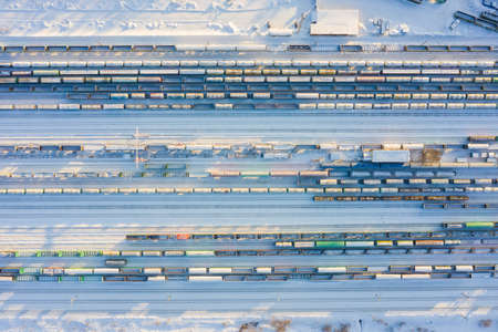 Branches of the railway at the marshalling yard, a lot of freight wagons from the heightの写真素材
