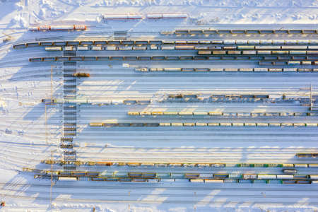 Branches of the railway at the marshalling yard, a lot of freight wagons from the heightの写真素材