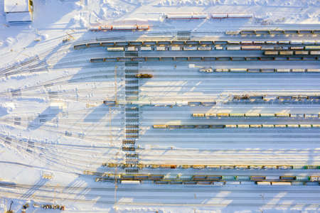Branches of the railway at the marshalling yard, a lot of freight wagons from the heightの写真素材