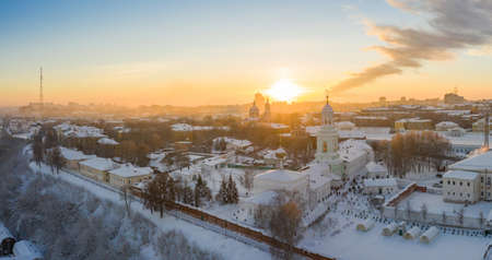 the city of Kirov and the high bank of the river Vyatka and the Alexander Grin Embankment and the rotunda on a sunny winter dayの写真素材