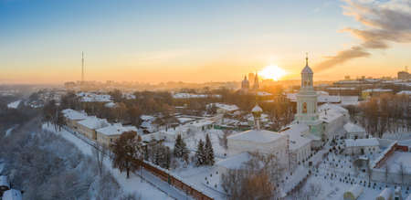 the city of Kirov and the high bank of the river Vyatka and the Alexander Grin Embankment and the rotunda on a sunny winter dayの写真素材