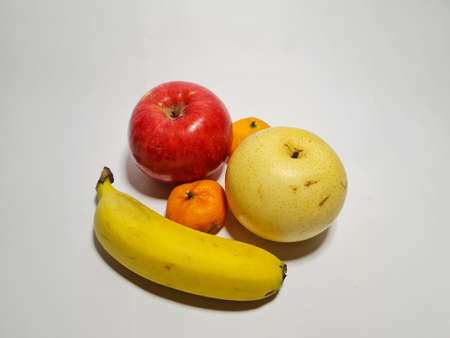 Various kinds of fruit on a white backgroundの写真素材