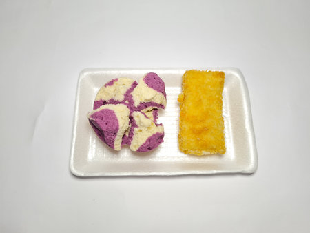 Typical Indonesian snacks, namely blooming steamed sponge bread and savory risoles