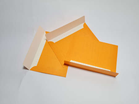 Yellow envelope on a white backgroundの写真素材