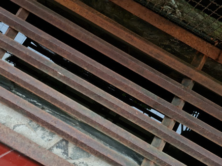 Dark brown iron gutter step background image