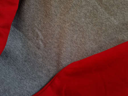 Abstract cloth background textured gray clothes combined with redの写真素材
