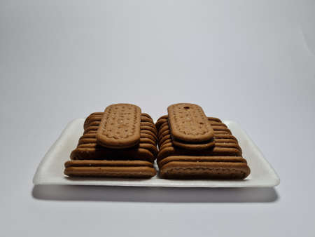 Snacks made from flour and other ingredients that have a chocolate taste are called biscuitsの写真素材