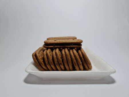 Snacks made from flour and other ingredients that have a chocolate taste are called biscuitsの写真素材