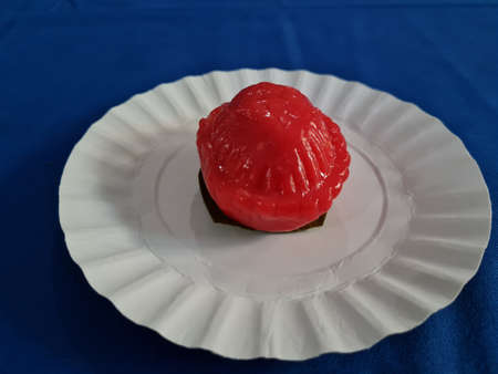 Ku cake made of glutinous rice flour filled with red green beans is shaped like a turtle shellの写真素材