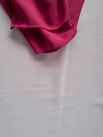 Abstract background of dark red cloth combined with other colors