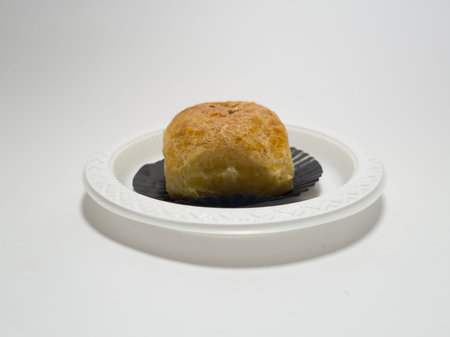 The market snack is banana cake in a white container