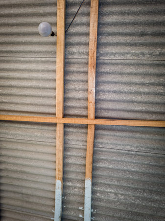 The roof of the house is made of paper and cement, namely gray asbestos