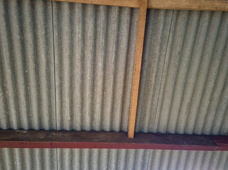 The roof of the house is made of paper and cement, namely gray asbestos