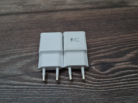White cell phone chargers are usually used by cellphones that have run out of battery power